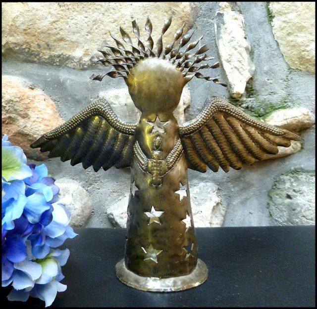 Angel design metal candle holder. Haitian metal art